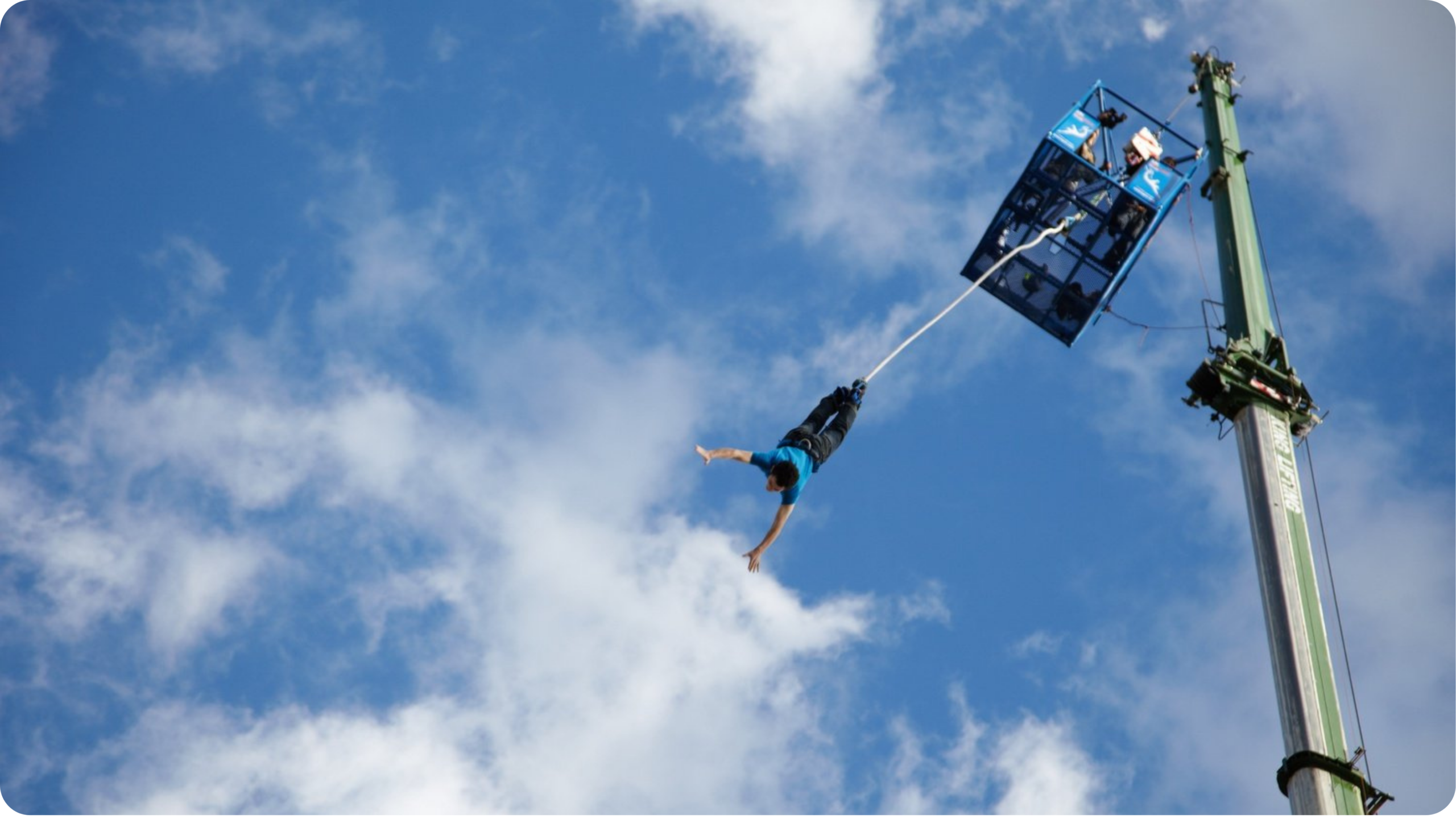 Someone bungee jumping from below
