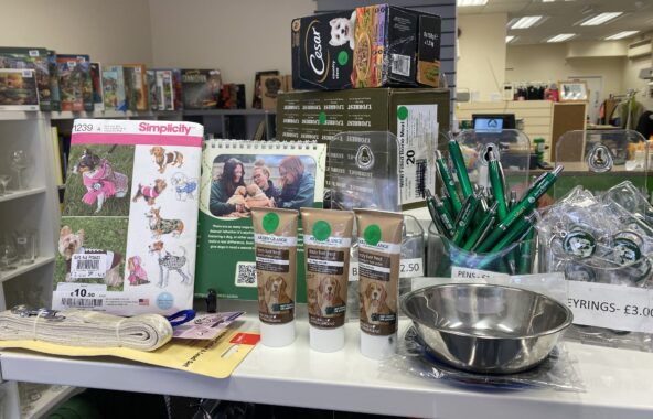 Dog food and dog products for sale in a Jerry Green Dog Rescue charity shop