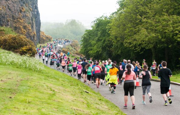 Group of runners on the Edinburgh Marathon course